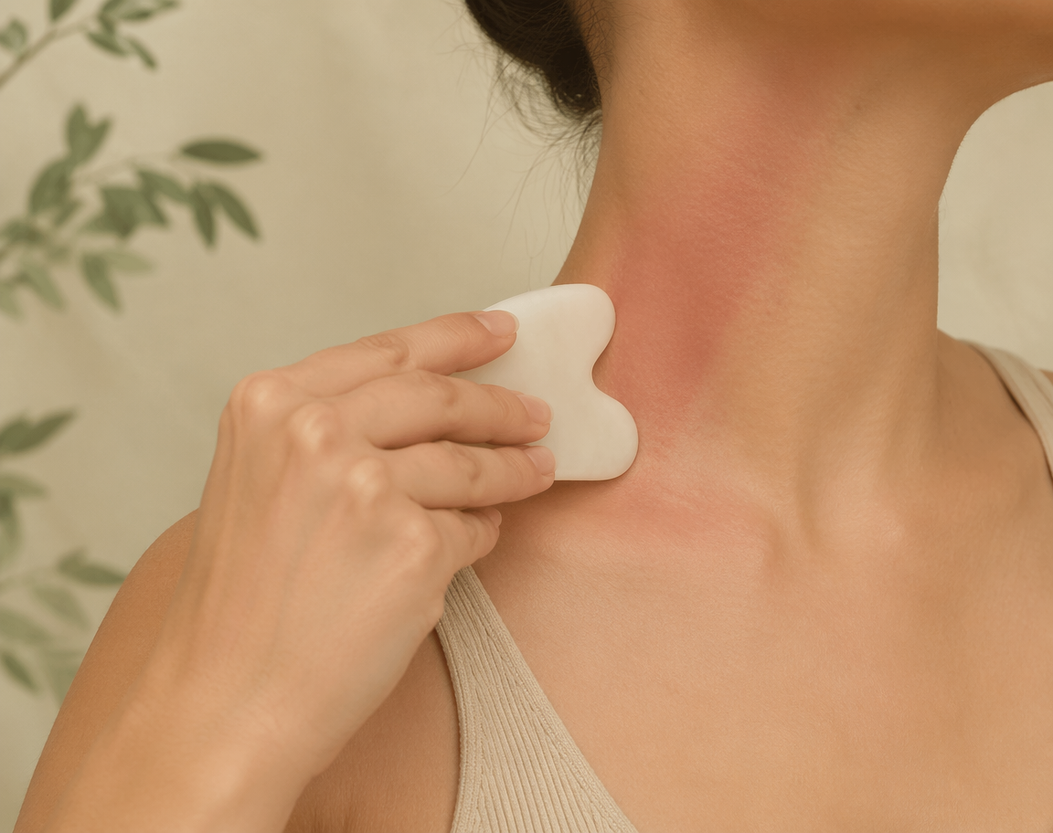 Gua sha stone on a neck